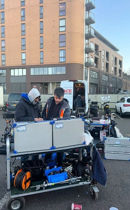 Crew and equipment on location for a film shoot