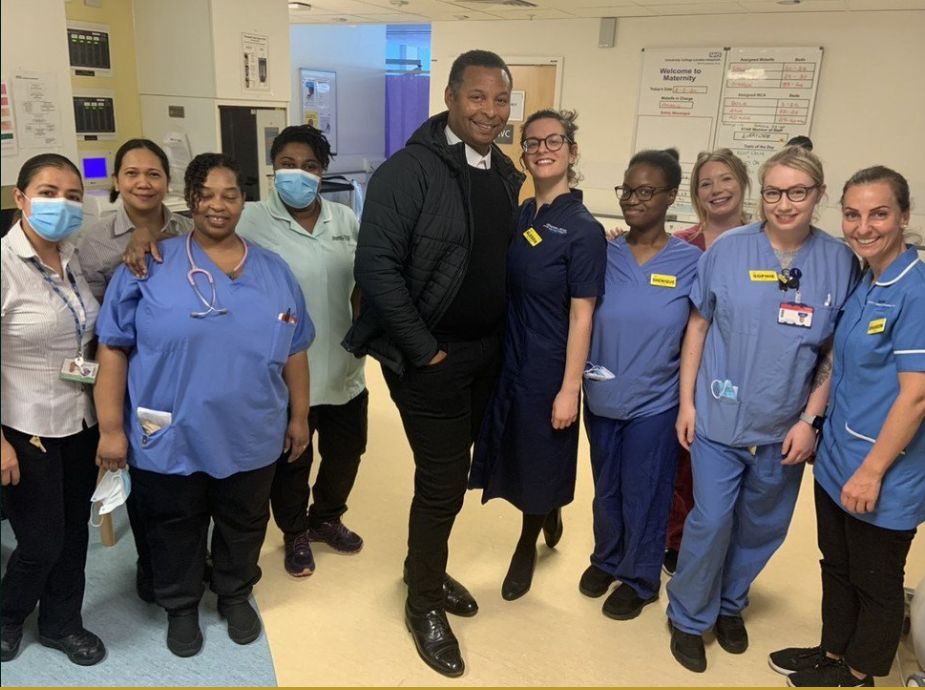 Harewood & Corbin with NHS staff at a London hospital